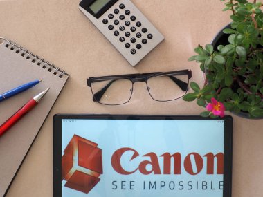 Garham, Bavaria, Germany - August 21, 2022: In this photo illustration, Canon Inc. logo seen displayed on a tablet