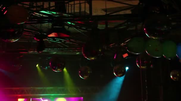 Lighting equipment at concert - colored spotlights on ceiling — Stock Video