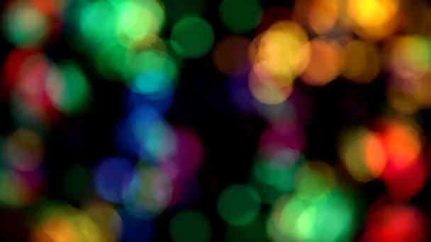 Renkli dairesel ışıklar arka defocused — Stok video