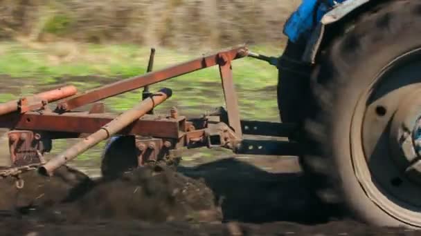 Tractor plowing at spring — Stock Video
