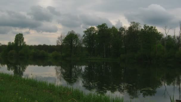 Timelapse with storm clouds moving over lake — Stock Video