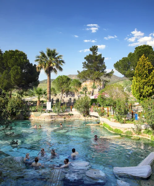 Ourists bathing in ancient pool in Turkey — Stock Photo, Image