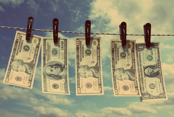 Paper dollars are drying on rope - vintage retro style — Stock Photo, Image