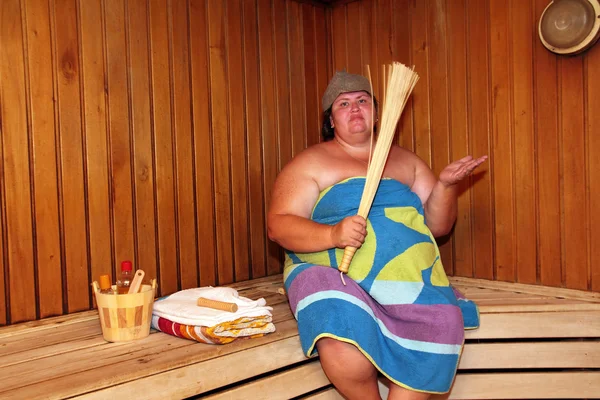 Fun big woman in sauna — Stock Photo, Image