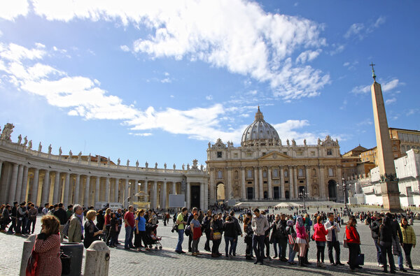 People in Vatican City wait for the Papal conclave