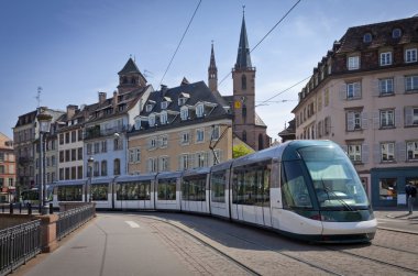 Modern tram on the streets of Strasbourg, France clipart