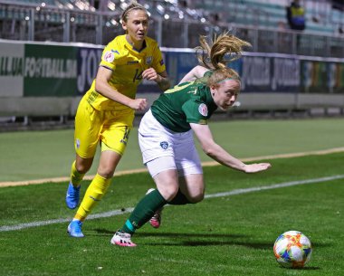 KYIV, UKRAINE - OCTOBER 23, 2020: UEFA Womens EURO 2022 Qualifying game Ukraine v Ireland at Obolon Arena in Kyiv. Lyubov Shmatko (#14, UKR) and Amber Barrett (#9, IRL)