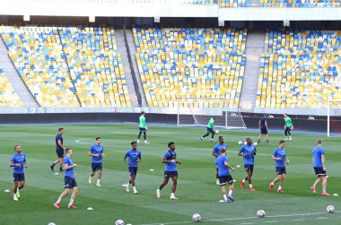 KYIV, UKRAINE - AUGUST 10, 2021: Genk players run during open training session before the UEFA Champions League third qualifying round game against Shakhtar Donetsk in Kyiv
