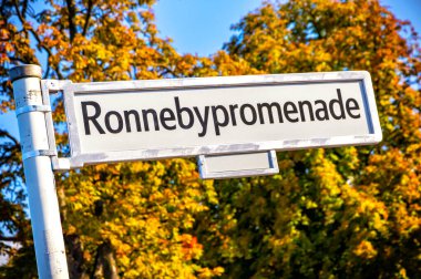 Ronnebypromenade park signpost in Berlin-Wannsee, locality in Berlin borough of Steglitz-Zehlendorf, Germany. Wannsee is well known as the number-one bathing and recreation spot for western Berlin