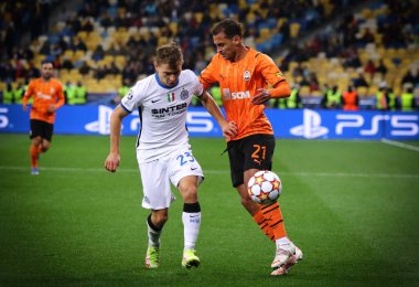 KYIV, UKRAINE - SEPTEMBER 28, 2021: UEFA Champions League game Shakhtar Donetsk v Internazionale. Alan Patrick (Shakhtar) and Nicolo Barella (Inter). NSC Olimpiyskyi stadium in Kyiv