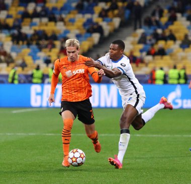 KYIV, UKRAINE - SEPTEMBER 28, 2021: UEFA Champions League game Shakhtar Donetsk v Internazionale. Mykhailo Mudryk (Shakhtar) and Denzel Dumfries (Inter). NSC Olimpiyskyi stadium in Kyiv