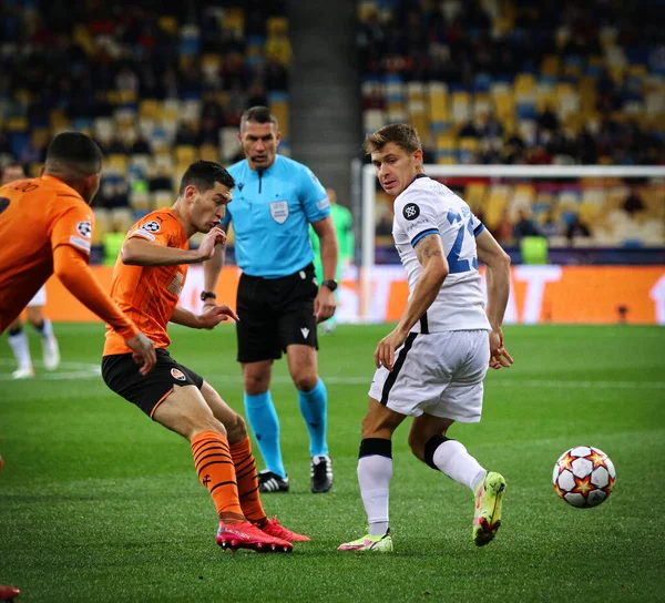 KYIV, UKRAINE - SEPTEMBER 28, 2021: UEFA Champions League game Shakhtar Donetsk v Internazionale. Taras Stepanenko (Shakhtar) and Nicolo Barella (Inter). NSC Olimpiyskyi stadium in Kyiv