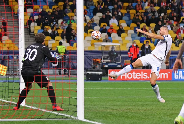 KYIV, UKRAINE - SEPTEMBER 28, 2021: UEFA Champions League game Shakhtar Donetsk v Internazionale. Goalkeeper Andriy Pyatov (Shakhtar) and Edin Dzeko (Inter). NSC Olimpiyskyi stadium in Kyiv