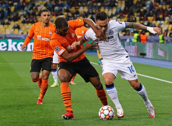 KYIV, UKRAINE - SEPTEMBER 28, 2021: UEFA Champions League game Shakhtar Donetsk v Internazionale. Marlon (Shakhtar) and Lautaro Martinez (Inter). NSC Olimpiyskyi stadium in Kyiv
