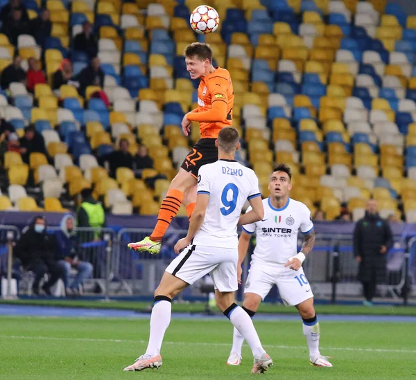 KYIV, UKRAINE - SEPTEMBER 28, 2021: UEFA Champions League game Shakhtar Donetsk v Internazionale. Mykola Matviyenko (Shakhtar), Edin Dzeko and Lautaro Martinez (Inter). NSC Olimpiyskyi stadium in Kyiv