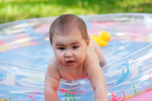 Baby in pool — Stock Photo, Image