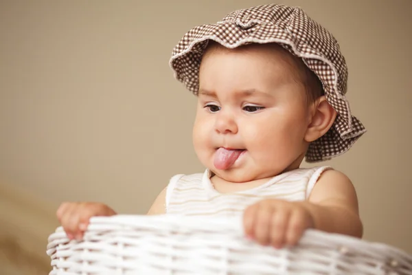 Eight month baby in basket — Stock Photo, Image