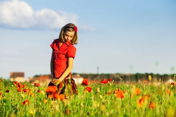 Girl in poppies — Stock Photo, Image