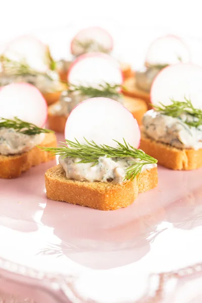 Canapes with radish — Stock Photo, Image