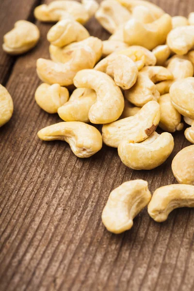 Cashews in wooden bowl — Stock Photo, Image