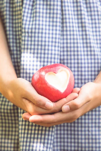 Red apple with heart shape — Stock Photo, Image
