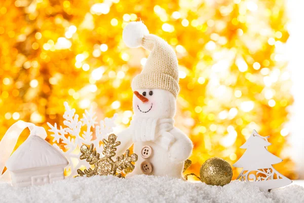 Snowman on gold — Stock Photo, Image