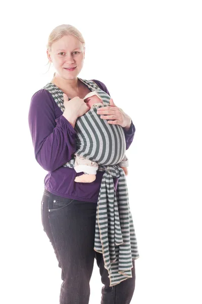 Newborn baby in sling — Stock Photo, Image