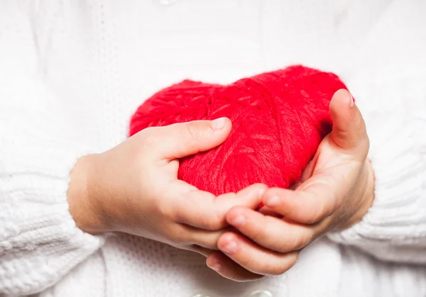 Red heart in hands — Stock Photo, Image