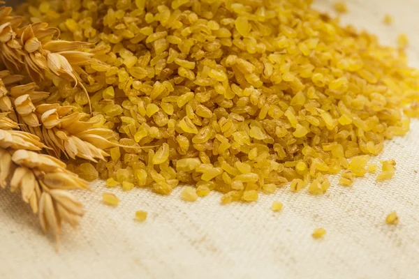 Bulgur in bag — Stock Photo, Image