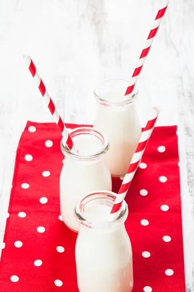 Milk in bottles — Stock Photo, Image