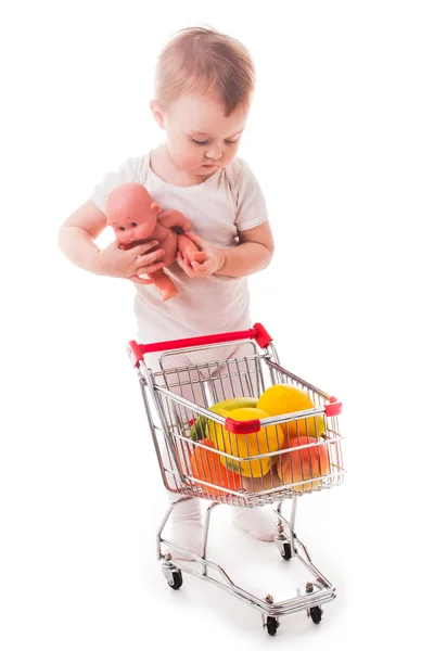 Kid plays in shop — Stock Photo, Image