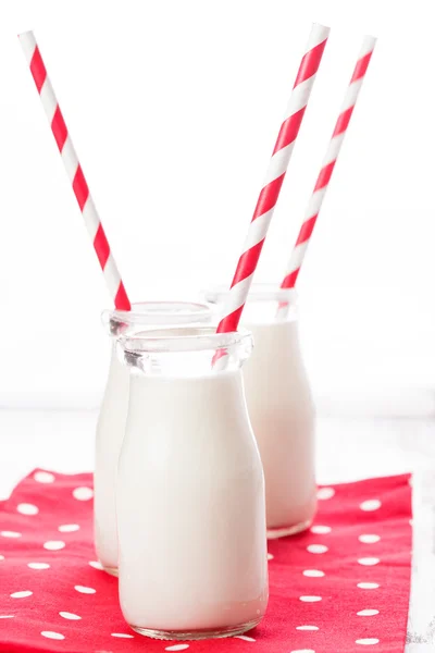 Milk in bottles — Stock Photo, Image