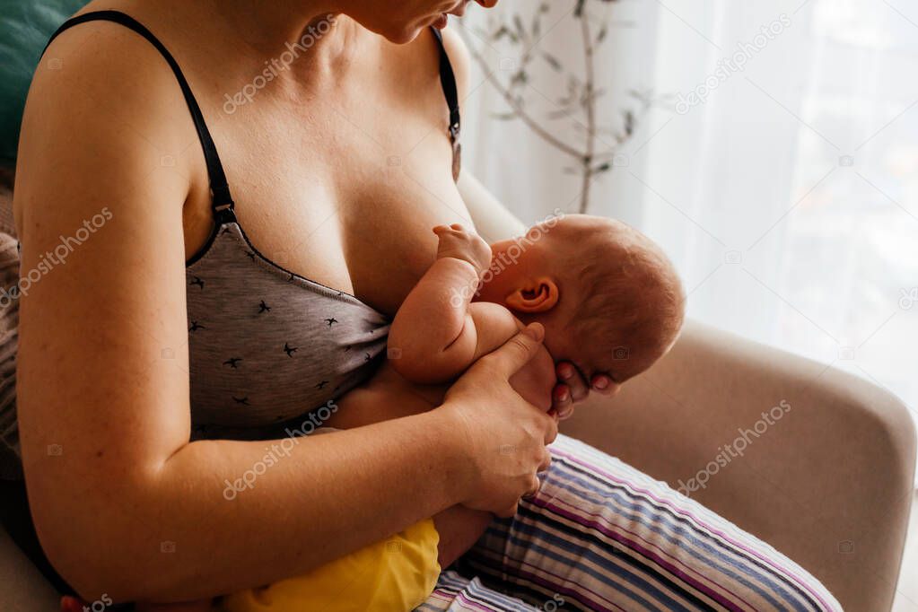 The young mom wants to breastfeed her newborn baby