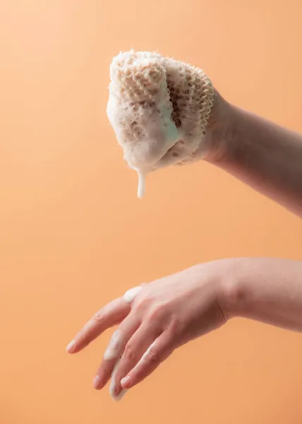 Natural biodegradable washcloth in the female hands — Stock Photo, Image