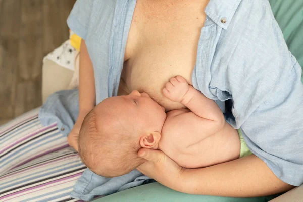 Great Breastfeeding Position - foodball hold, mother and baby — Stock Photo, Image