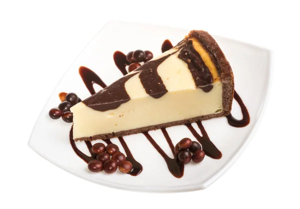 Cheesecake with chocolate sauce — Stock Photo, Image