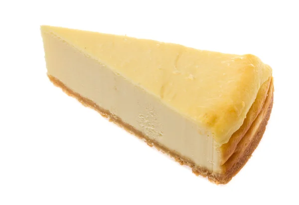 白地に隔離されたチーズケーキ — ストック写真