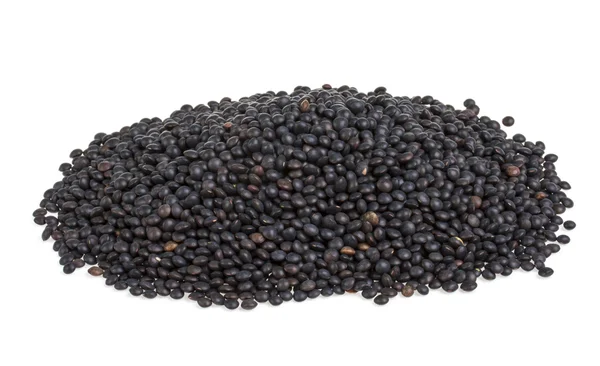 Heap of black lentil isolated on white — Stock Photo, Image