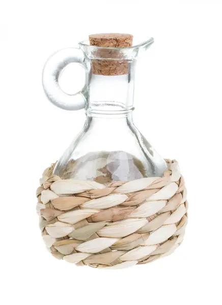 Bottiglia con tappo di paglia isolata su bianco — Foto Stock