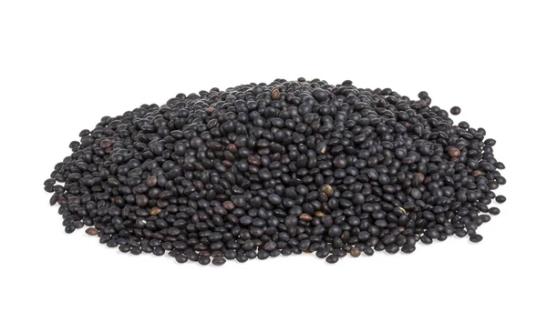 Heap of black lentil isolated on white — Stock Photo, Image