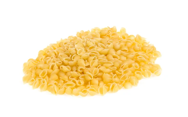 Heap of raw pasta (conchiglie) — Stock Photo, Image