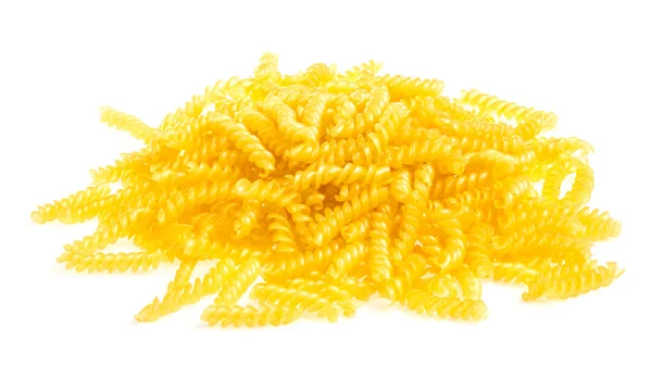 Högen av fusilli pasta på nära håll på trä bakgrund — Stockfoto