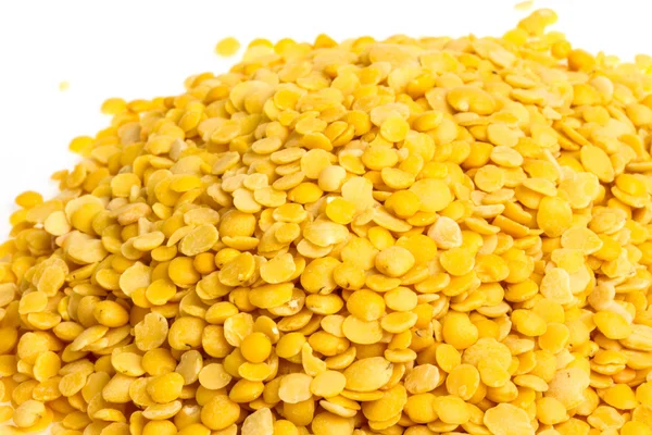 Yellow lentils isolated on white background. Macro shot — Stock Photo, Image