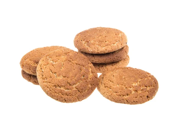 Tas de délicieux biscuits isolés sur fond blanc — Photo