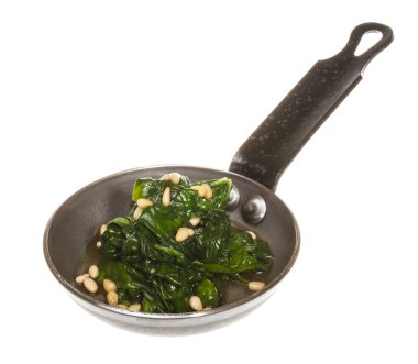 Kavrulmuş tavada haşlanmış ıspanak.