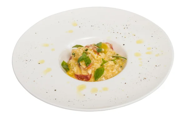 Photo of delicious risotto dish with herbs and tomato on white b — Stock Photo, Image