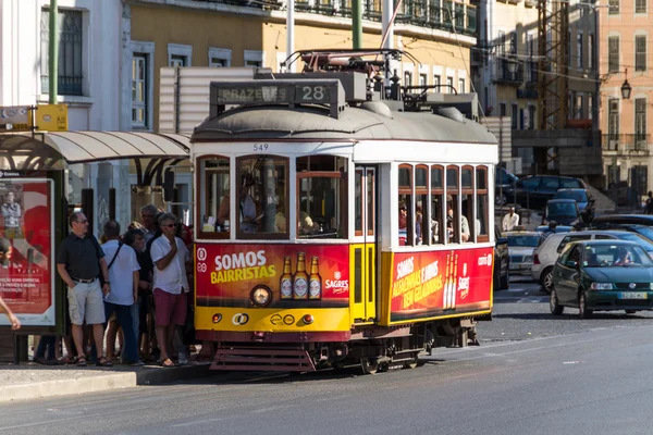 Traditional yellow and red tram — Stock Photo, Image