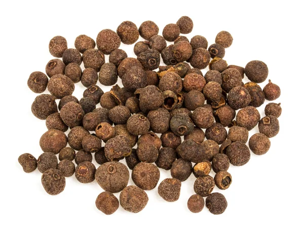 Pilha de sementes de pimenta isolada no fundo branco — Fotografia de Stock