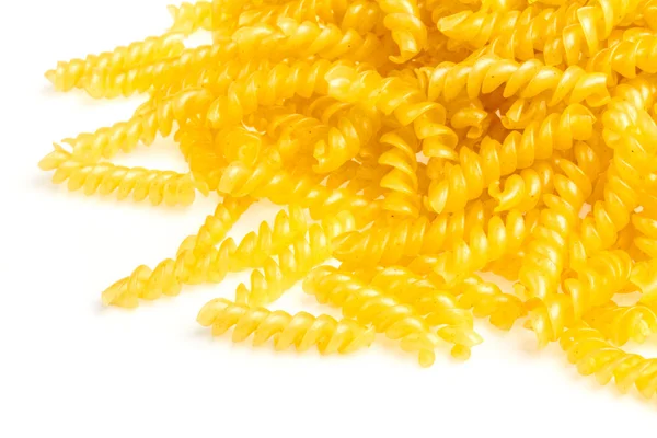 Haufen Fusilli Pasta aus nächster Nähe auf Holz Hintergrund — Stockfoto