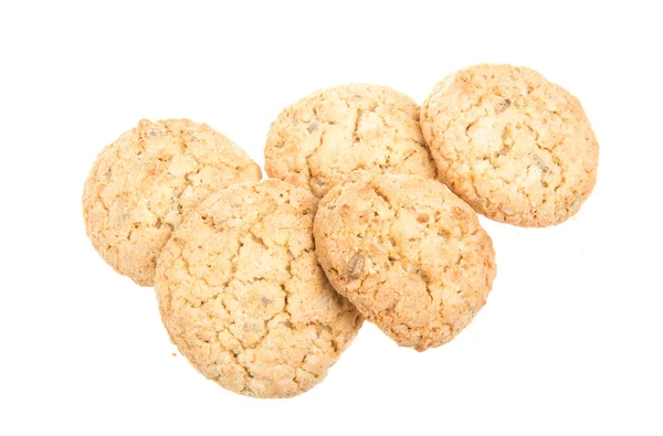 Montón de deliciosas galletas aisladas sobre fondo blanco — Foto de Stock